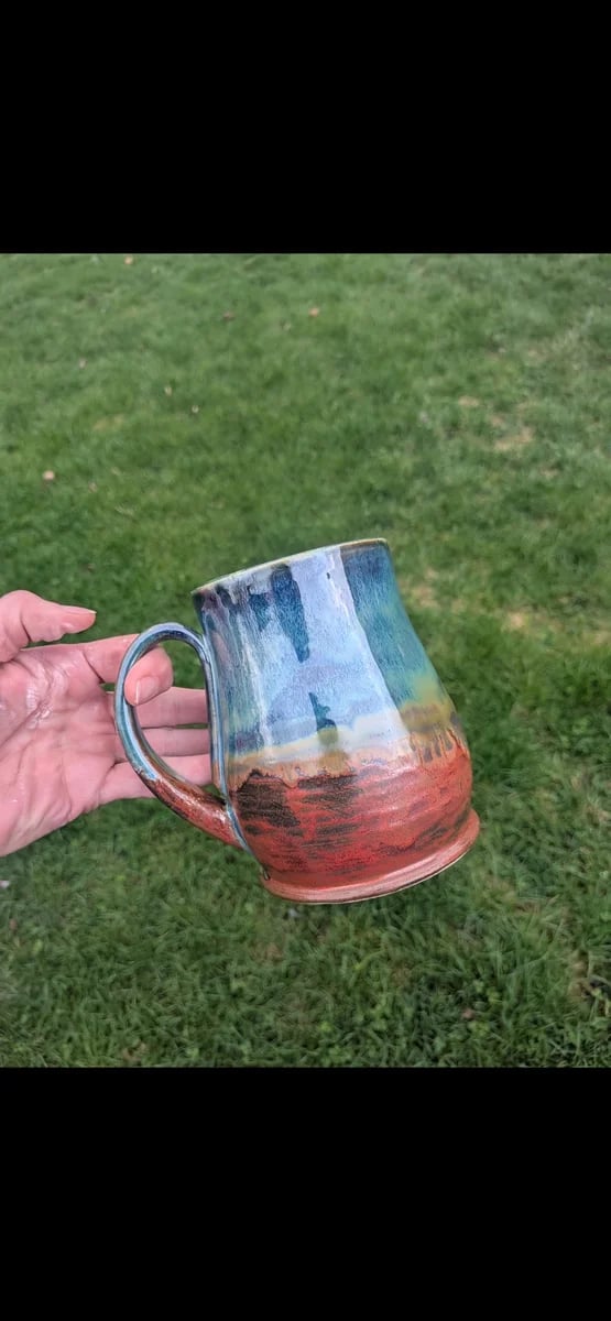 Handmade Shaw Hill Pottery mug with a landscape glaze