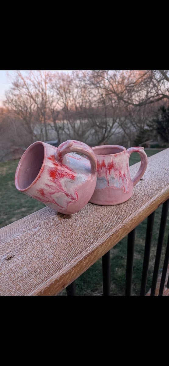 A matching pair of handmade Shaw Hill Pottery mugs