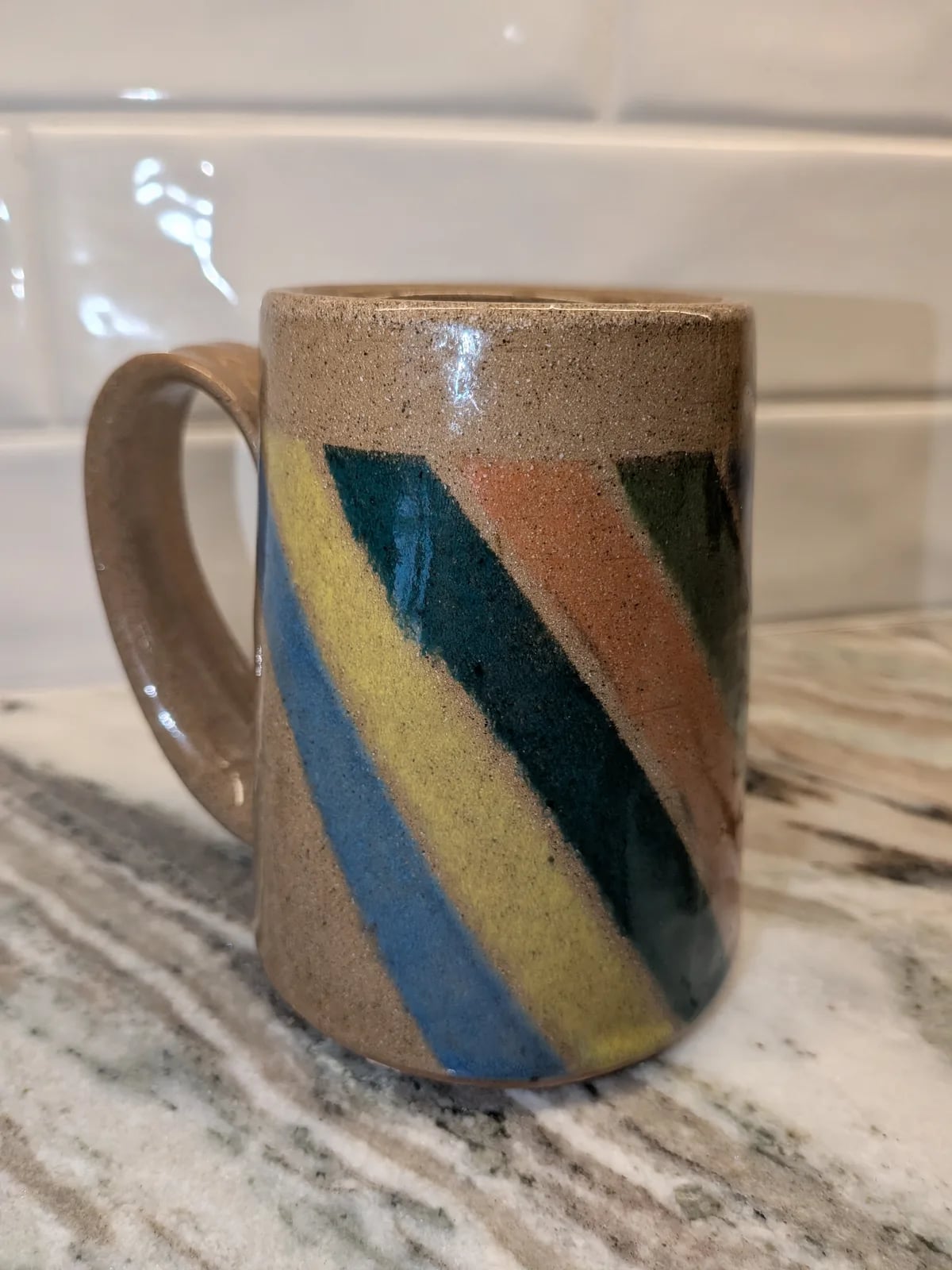 brown clay stripe mug.
